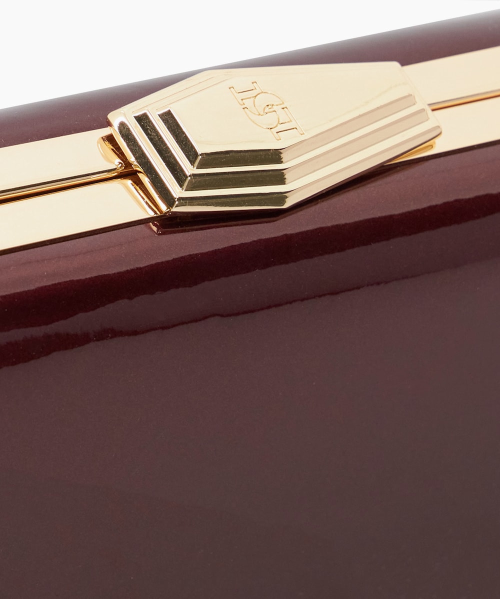 Burgundy patent clutch bag shop