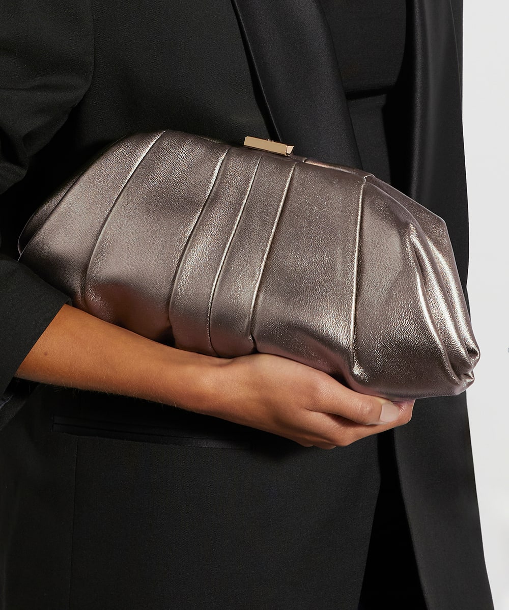 Hand held clutch bag deals