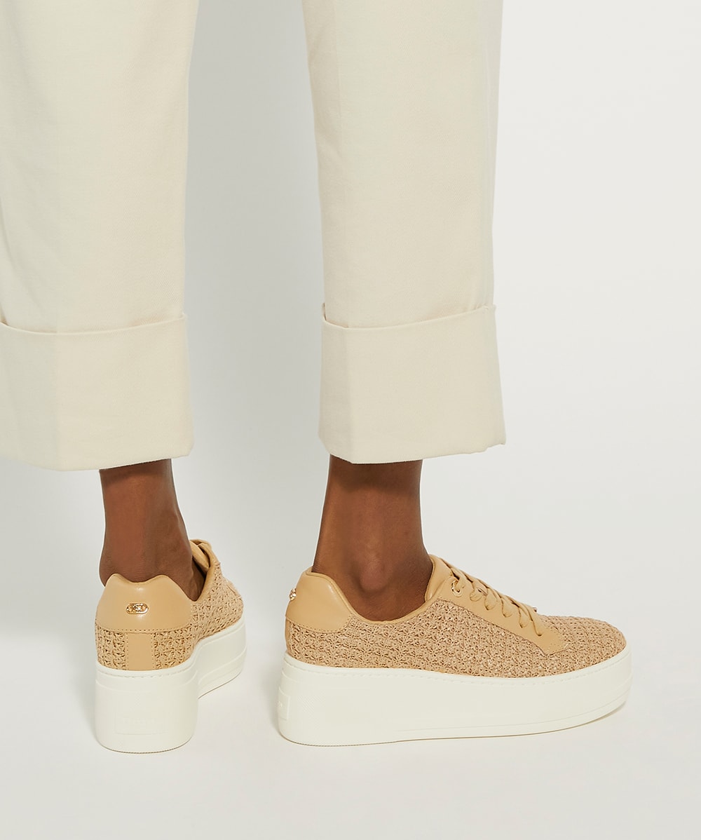 Beige platform trainers store