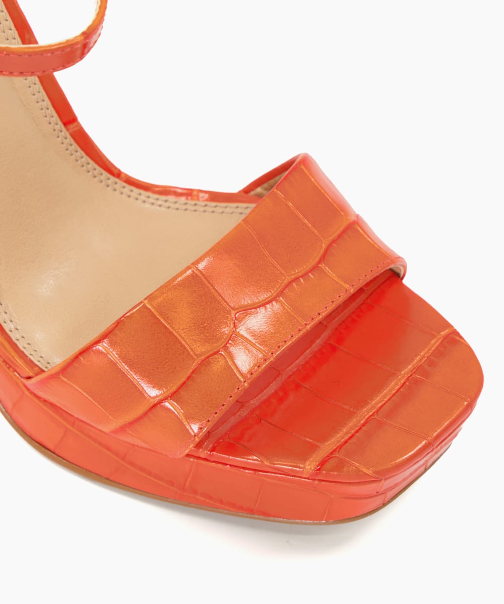Orange patent leather store sandals