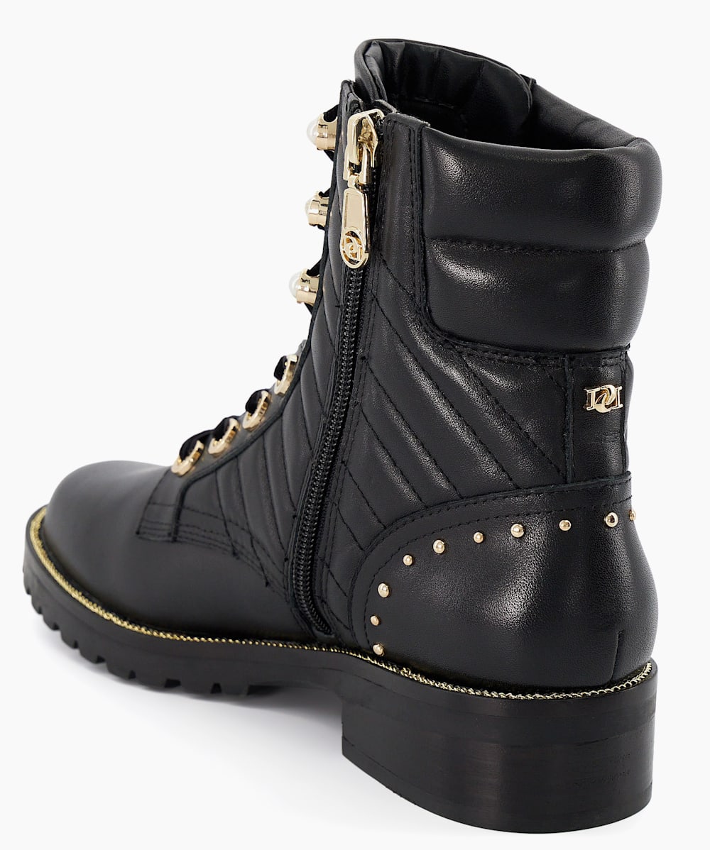 Chanel 1957 boots top