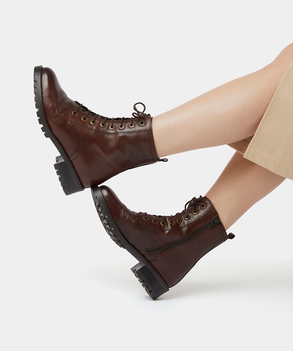 Lace up cleated boots store