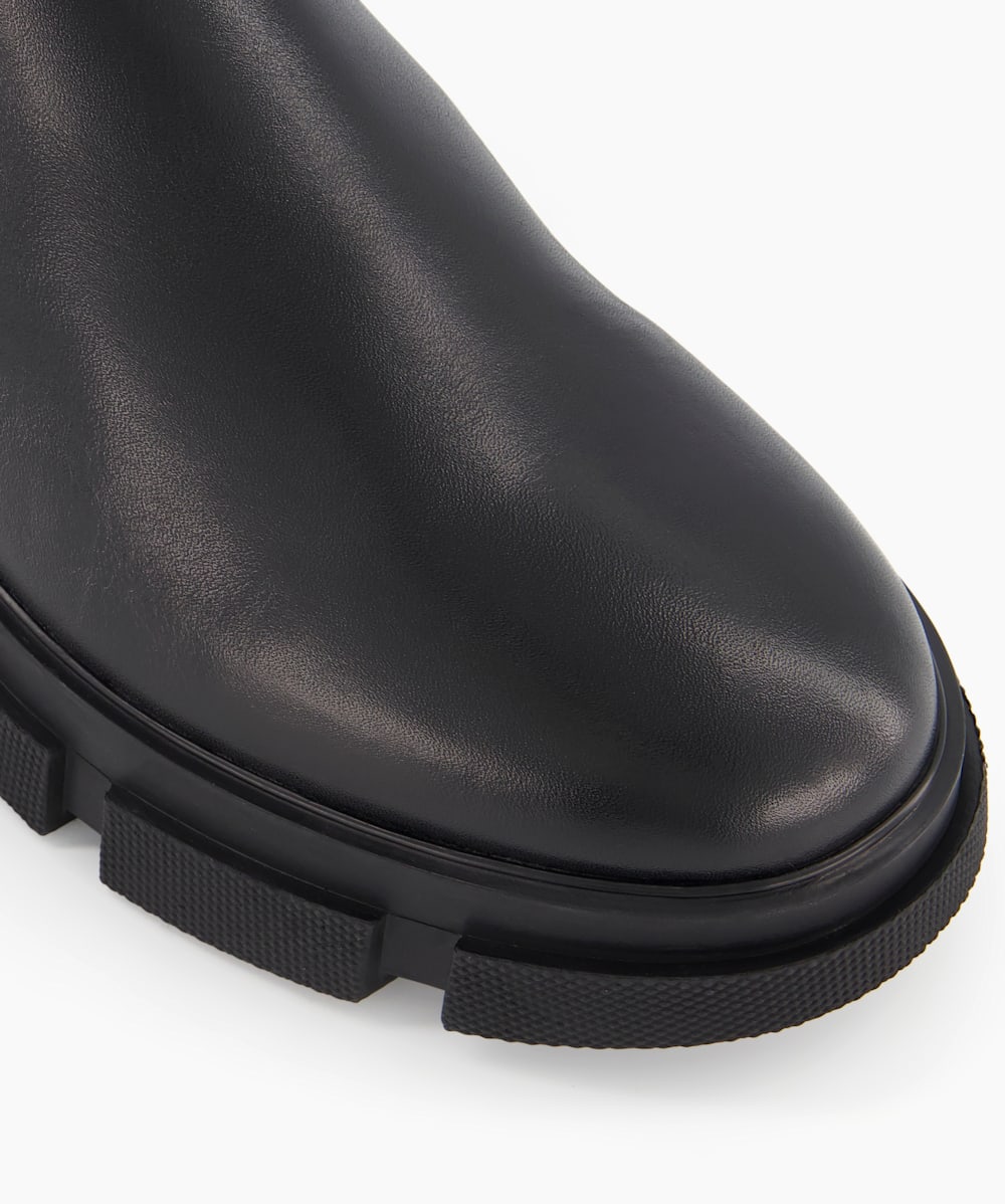Black boots brown sole best sale