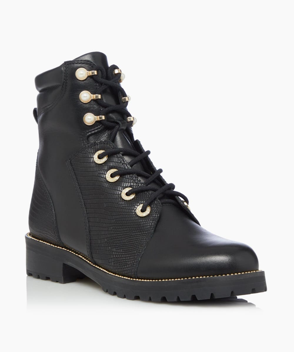 Pearl studded booties top