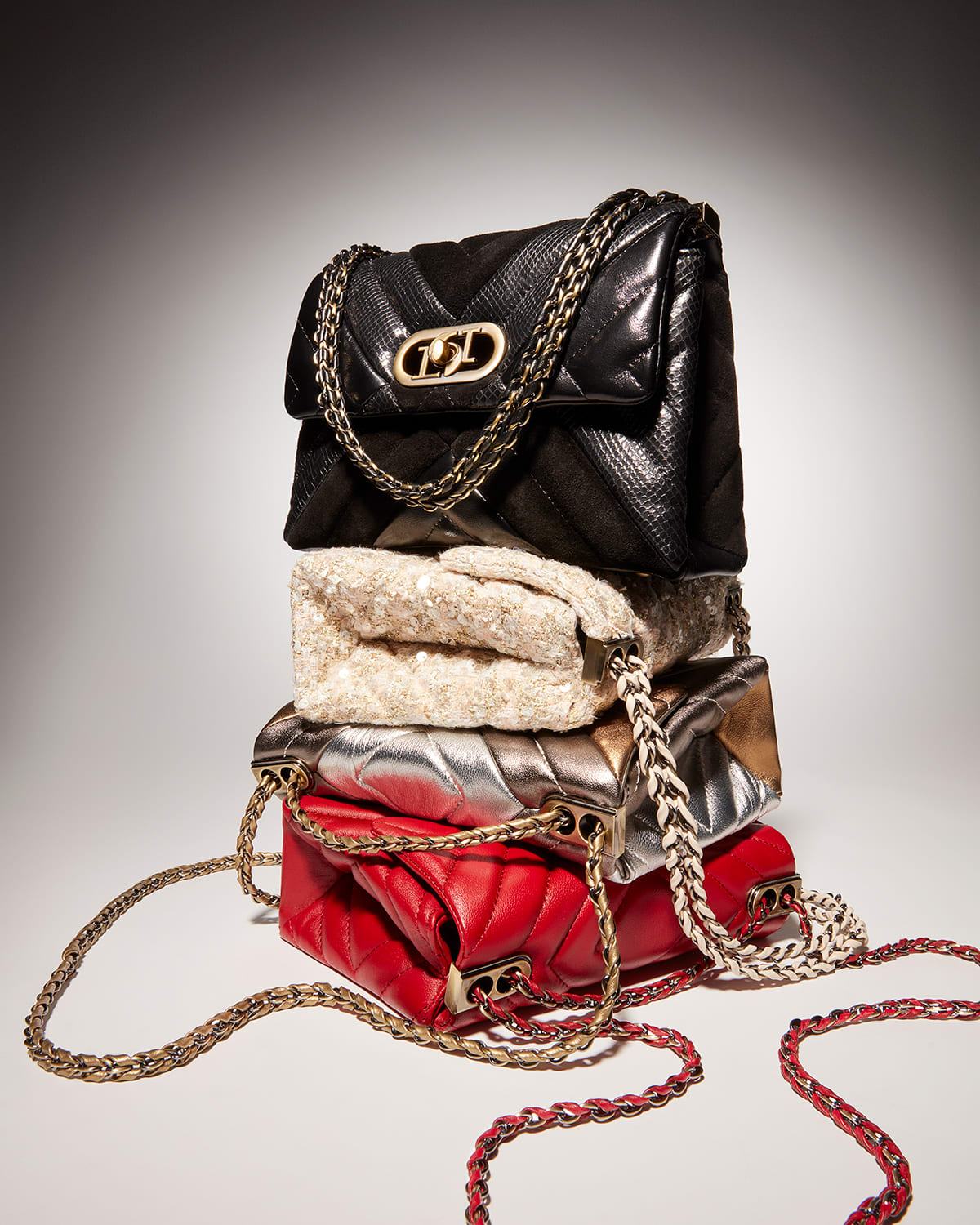 Still life image of our Regent bag in metallic, red and boucle