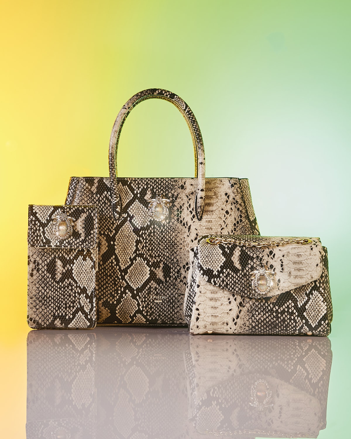 Dune London SS24 Trending: Snake Effect Daitlyn bag and Saskia clutch