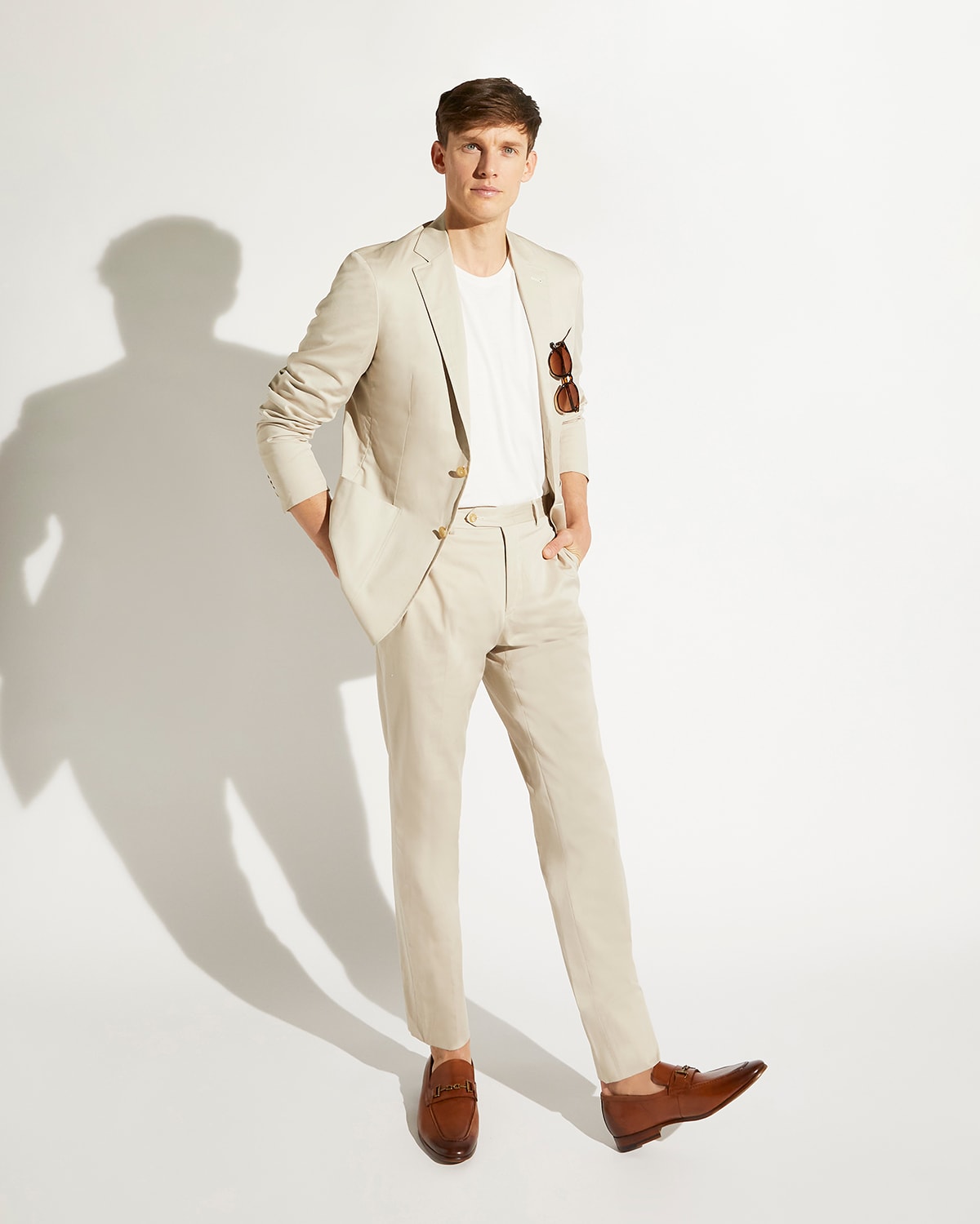 Model wearing the Dune London tan men's sanction loafer for The Style Series