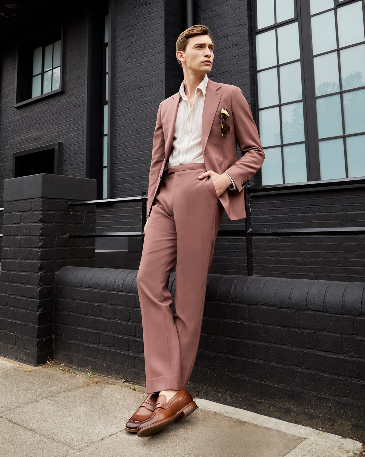 Model wearing our Sulli tan men's loafers