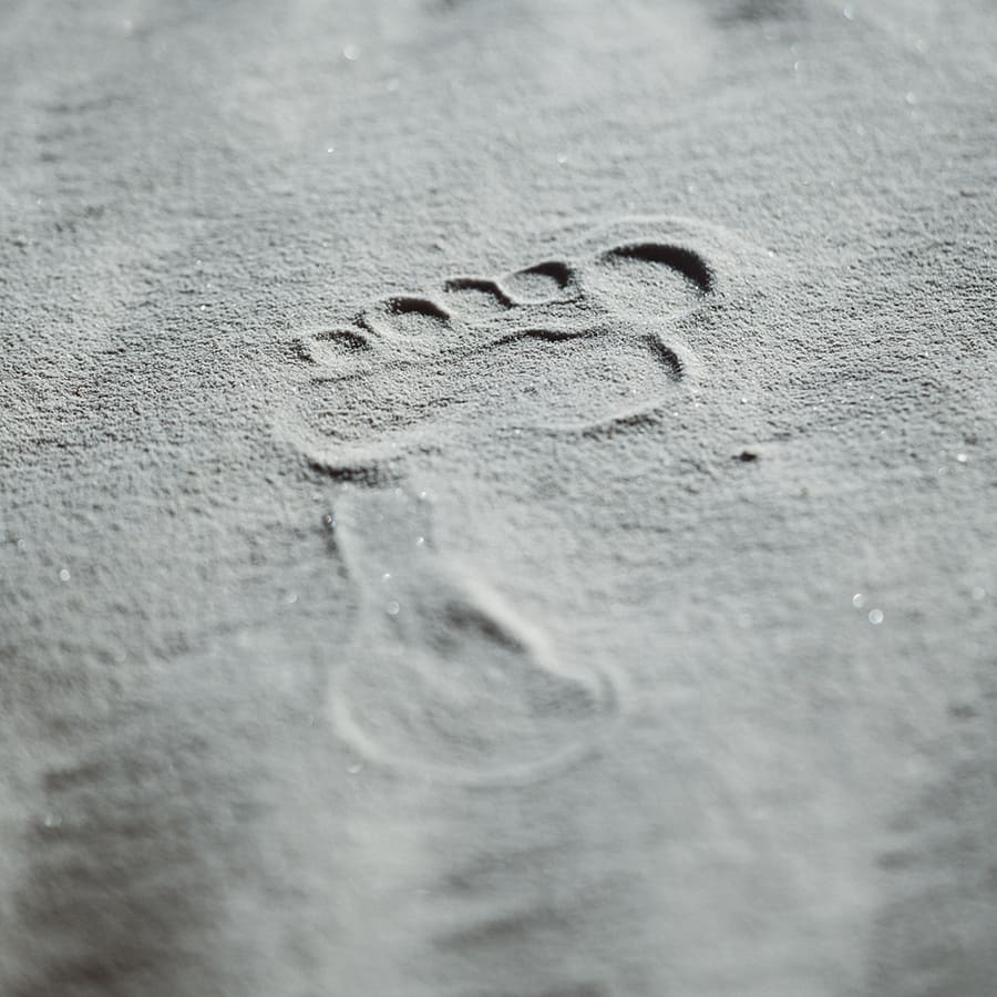 Image of foot step in sand