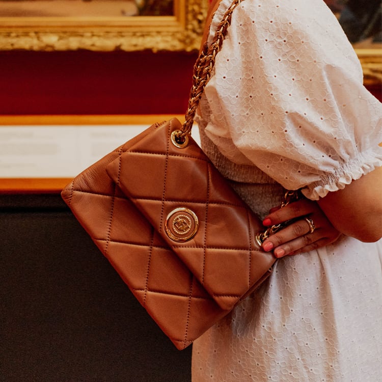 Close up of the camel leather Duchess bag