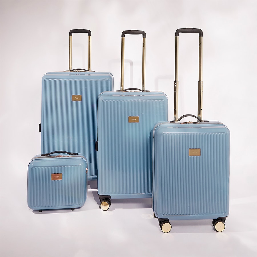 Still life shot of Dune London suitcases