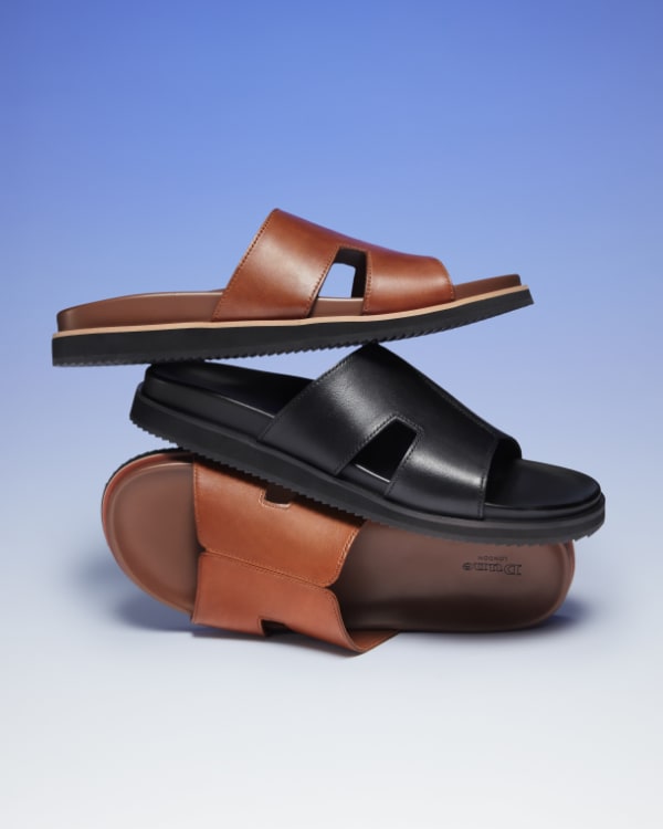 Men's slider sandal in tan and black leather