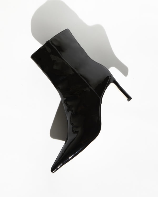 Women&rsquo;s black patent ankle boot with pointed toe