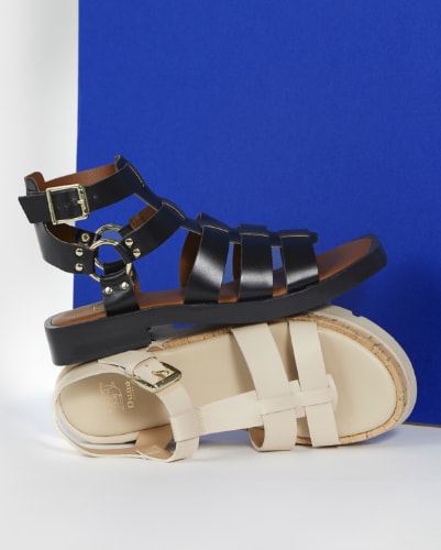 Women’s leather gladiator sandals in black and ecru