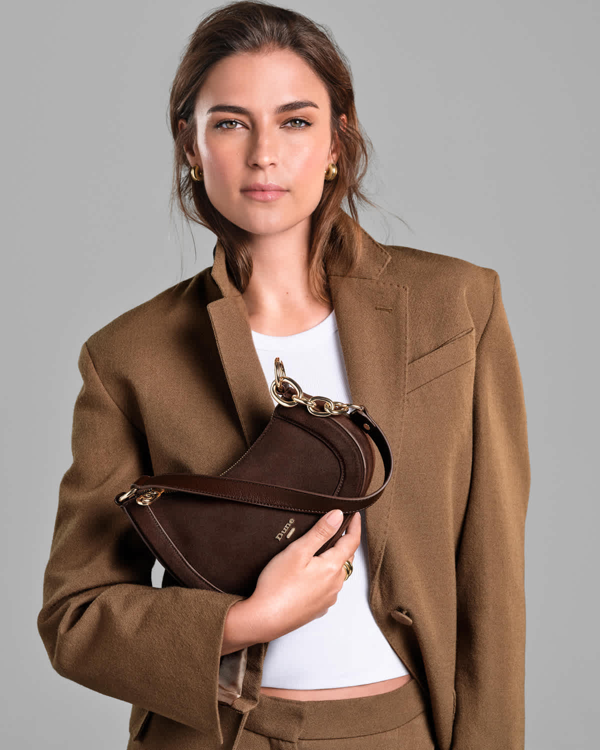 Dune London SS25 key bag styles Direction in brown