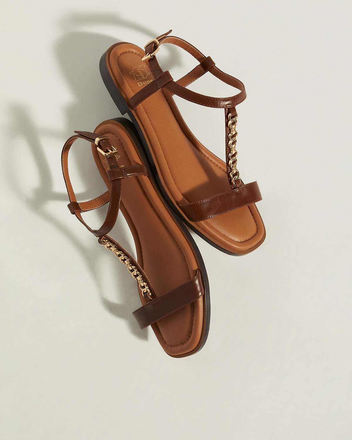 Brown leather sandals with chain detail