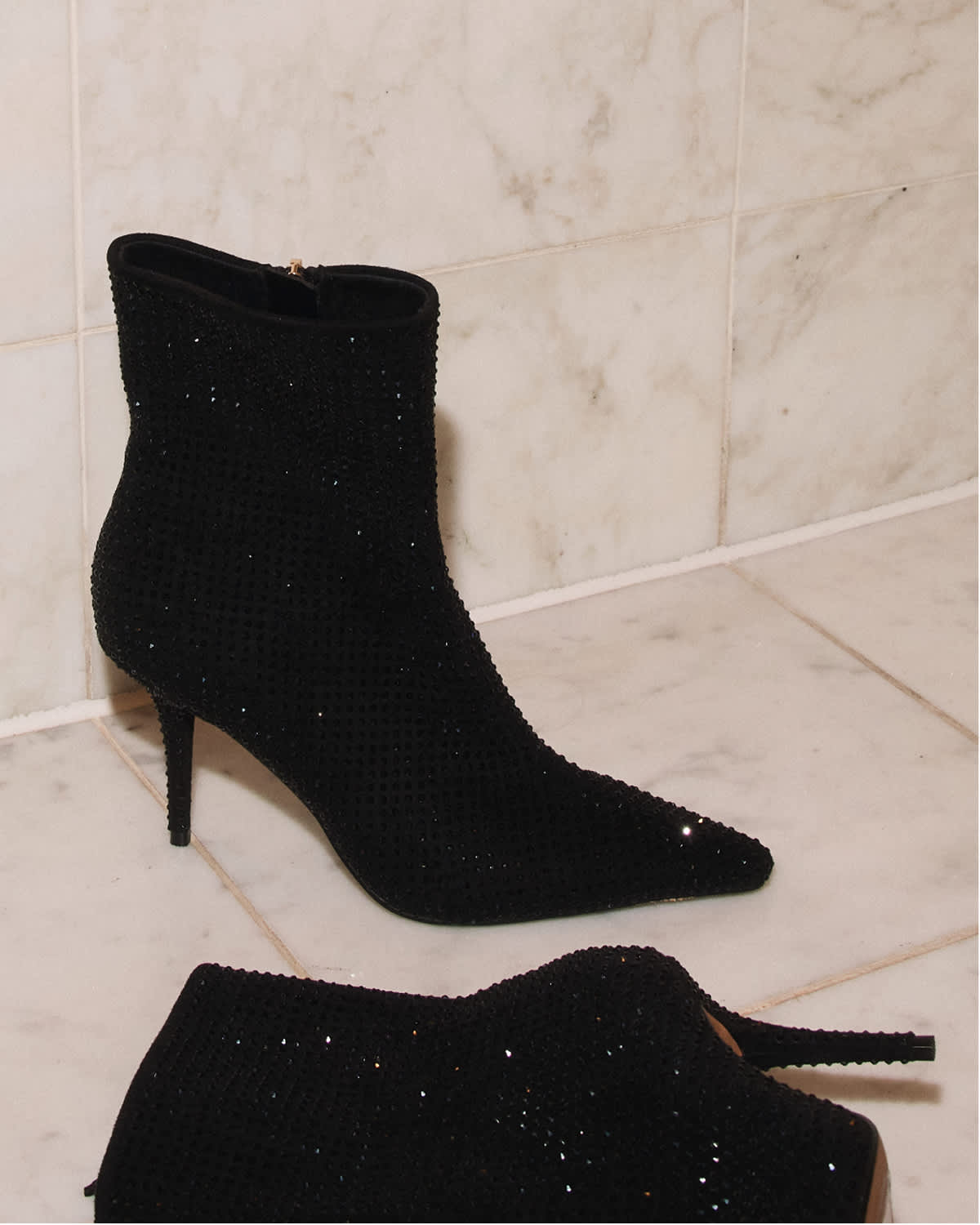 black embellished pointed toe boots with stiletto heel