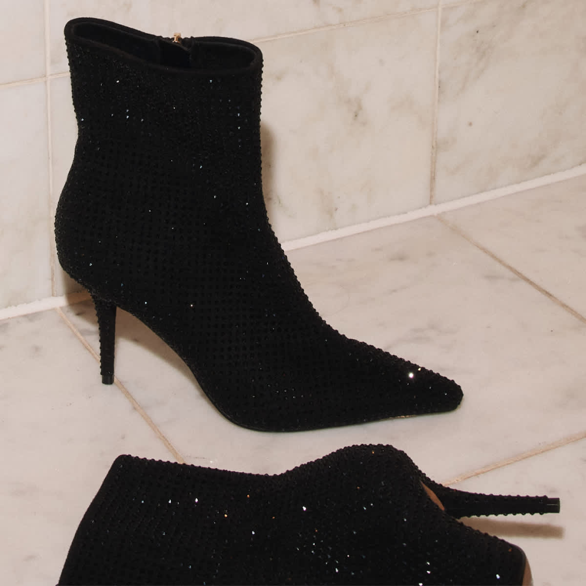 black embellished pointed toe boots with stiletto heel