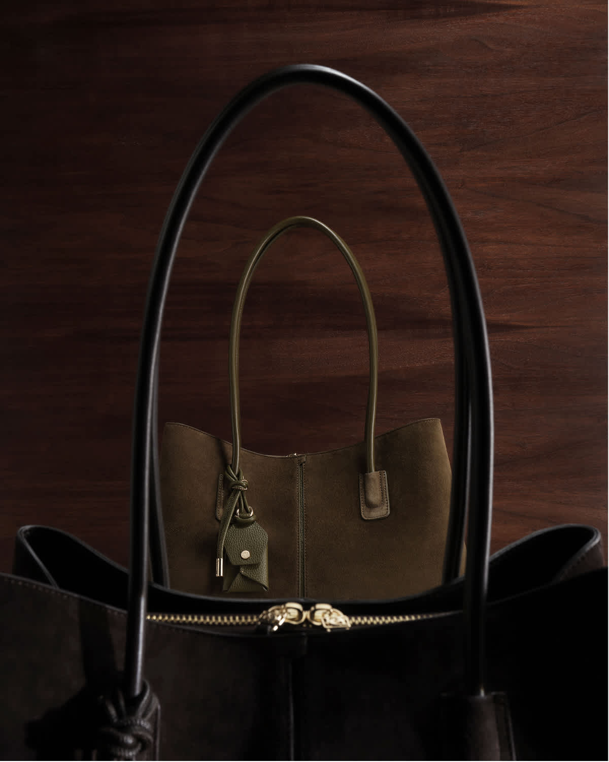 an image of one black and one khaki bag 