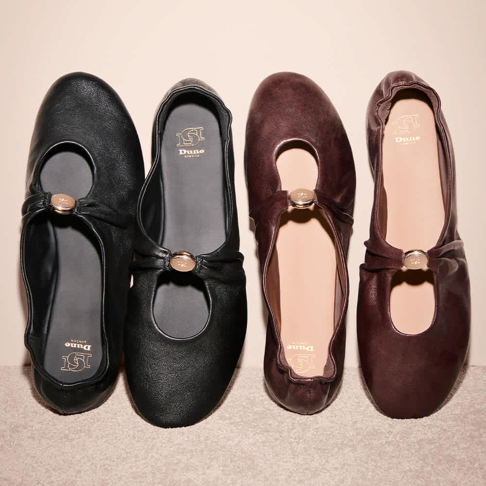 A dune london flat shoe with an old telephone 
