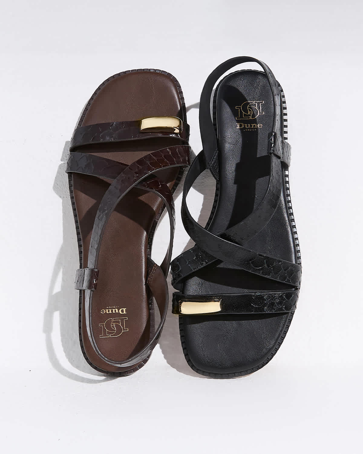 Women's Flat Leather Sandals in brown and black with gold detailing 