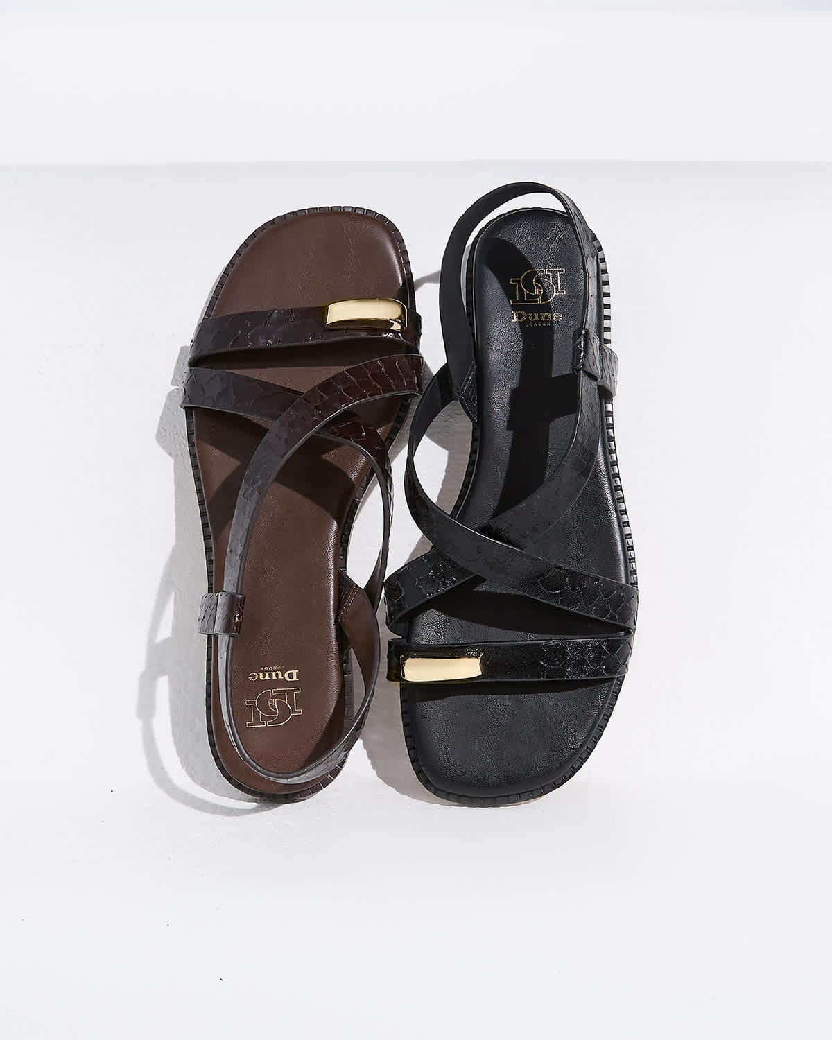 Women's Flat Leather Sandals in brown and black with gold detailing 