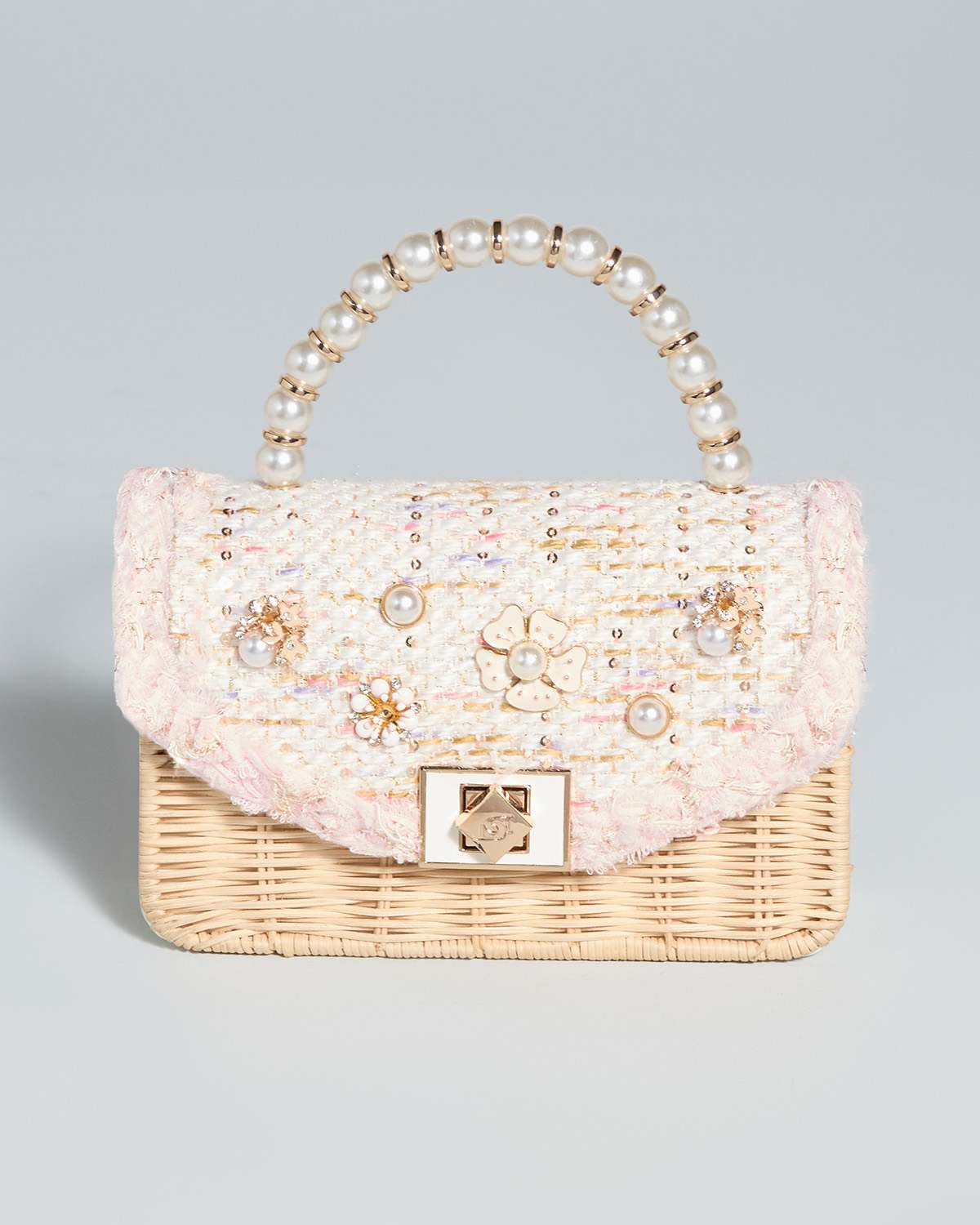 Floral embellished boucle top handle bag