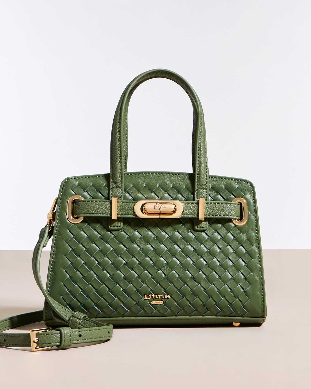 Green belted grab bag with woven detail and cross body strap