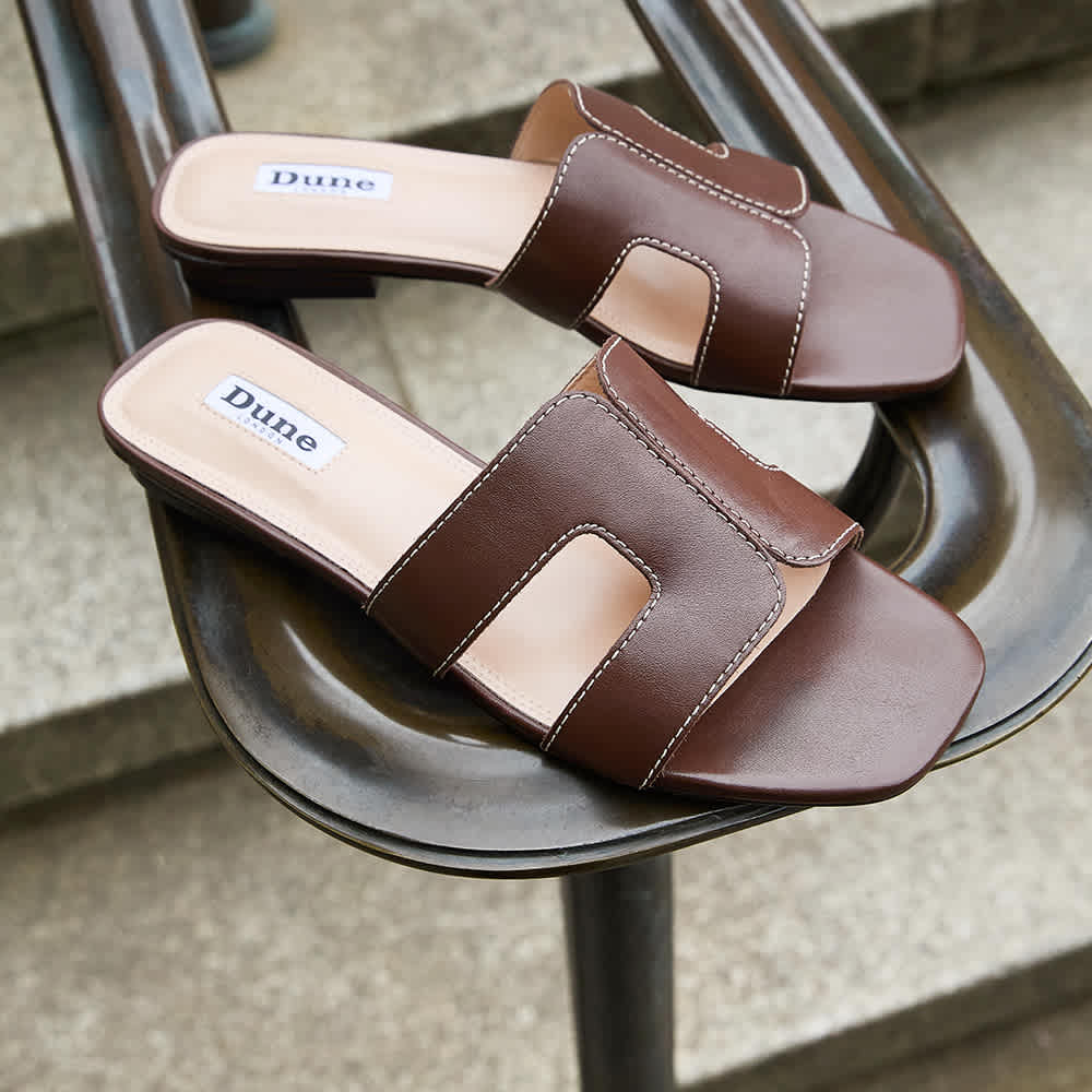 Women's flat sandals on a white background 