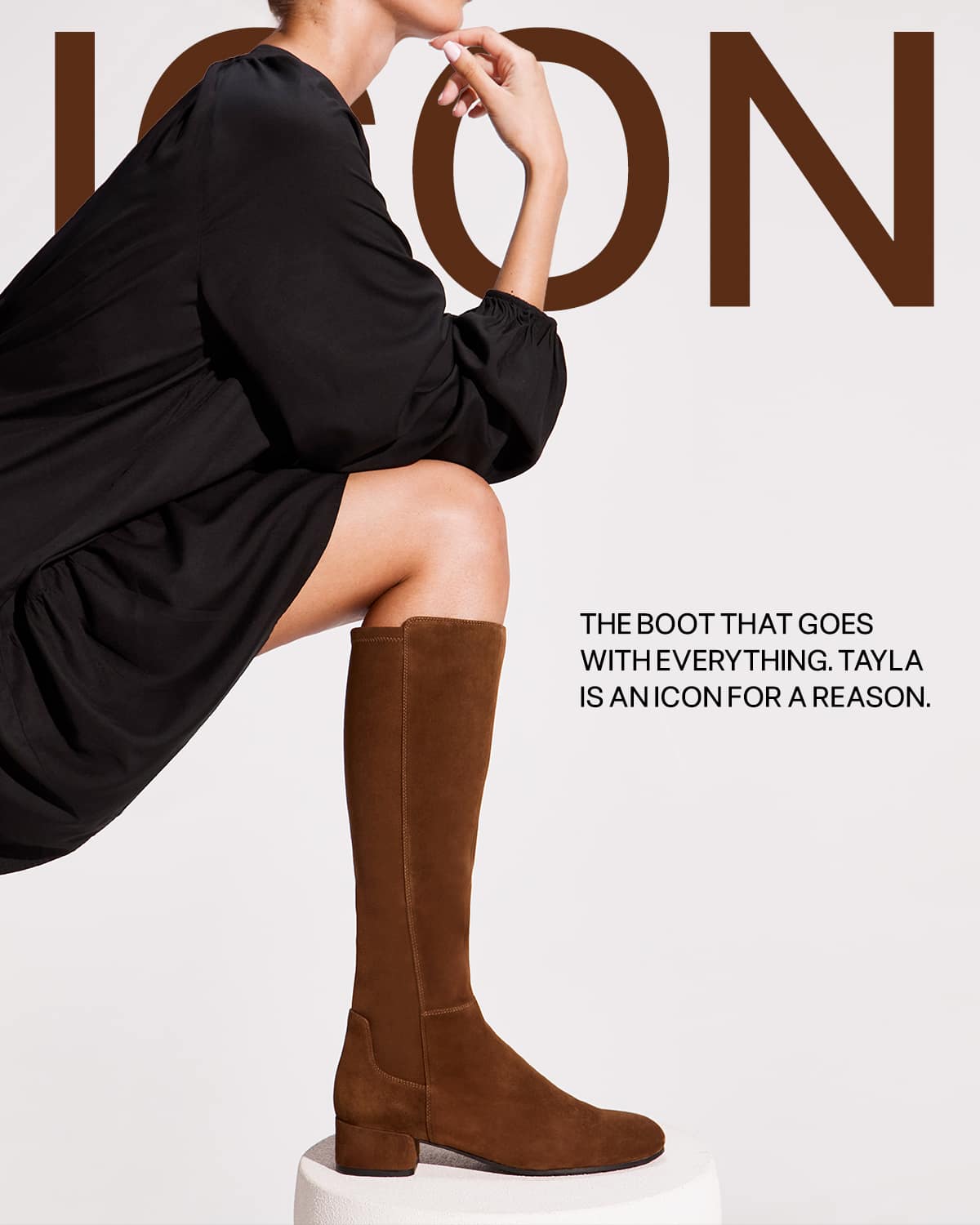 a woman wearing style 'Tayla', a Dune London boot