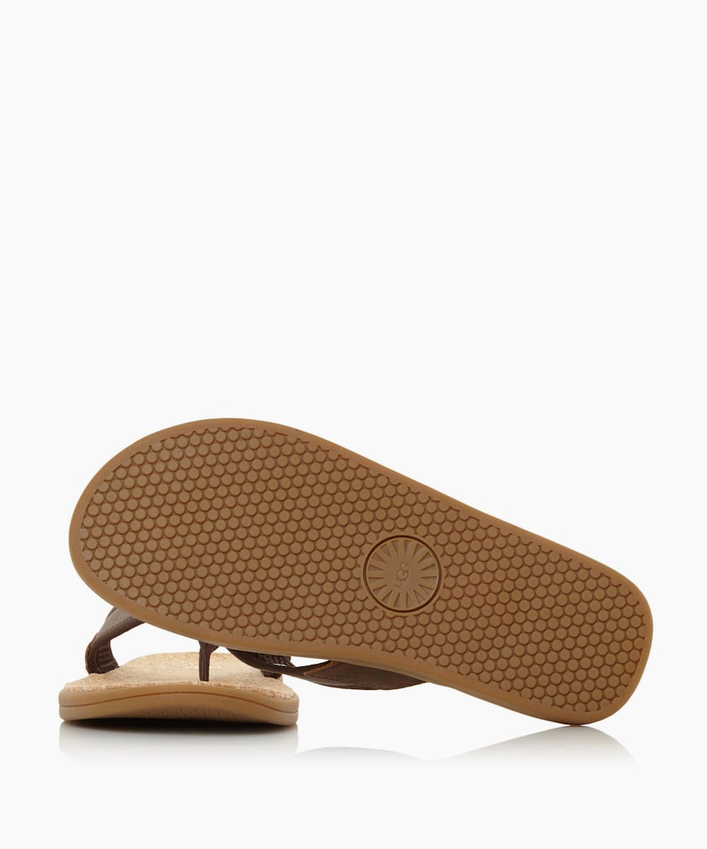 dune tan flip flops